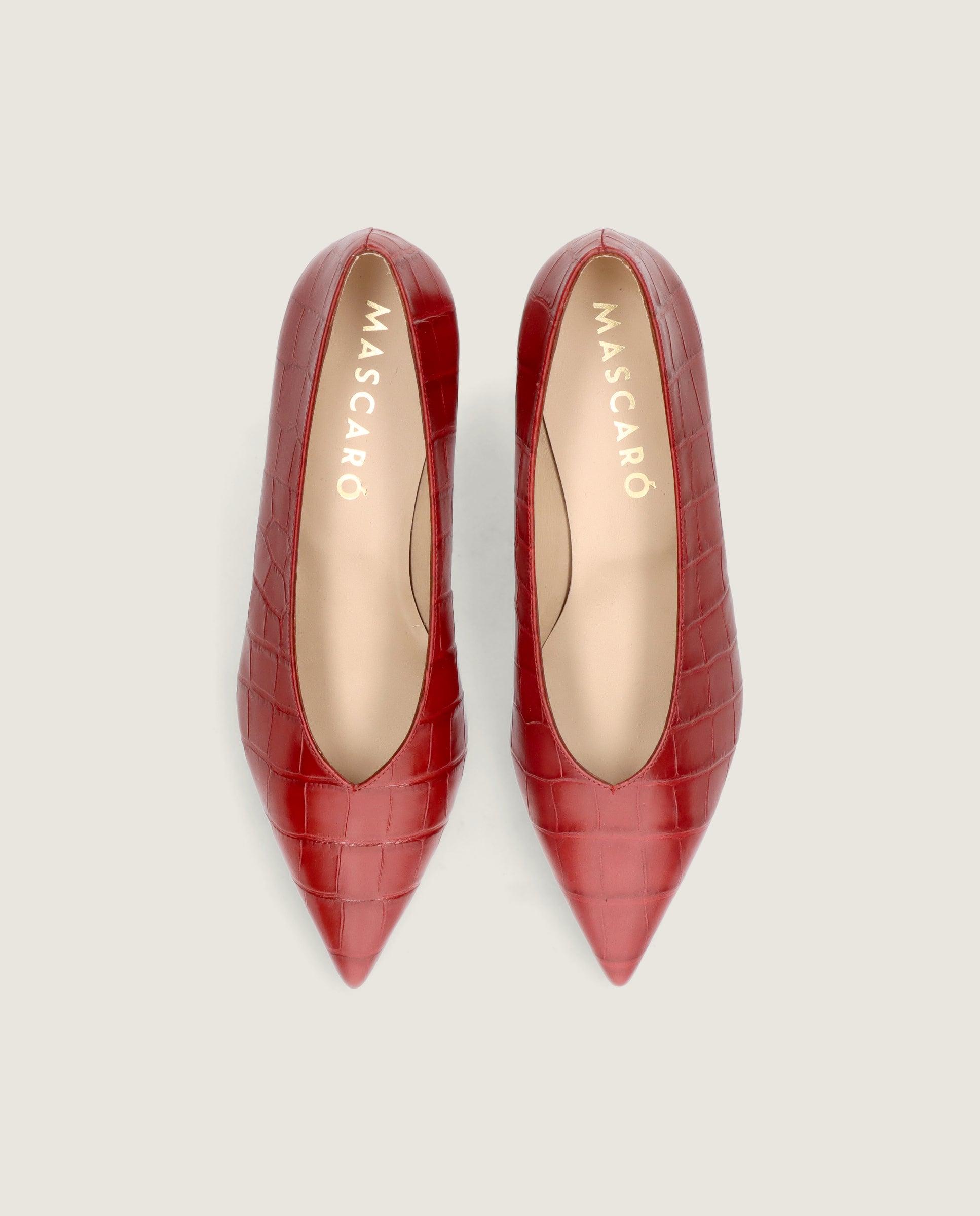 Salon Holly Rojos Pieles Estampadas