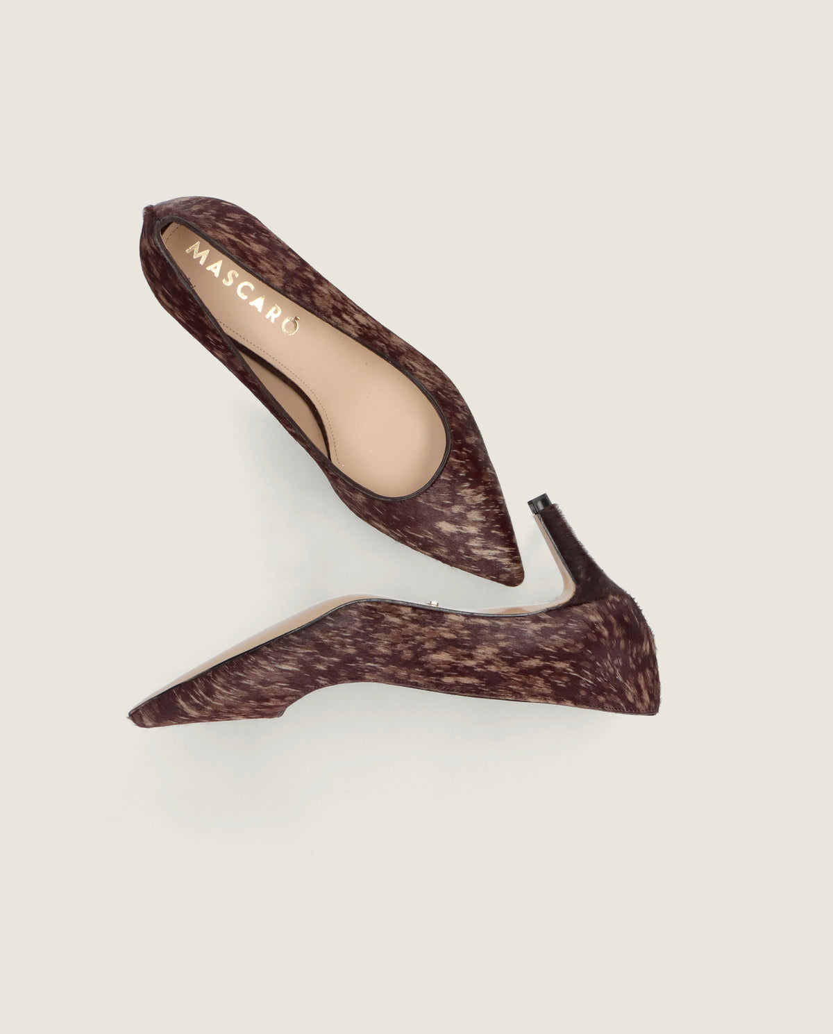 Noa pump in uneven animal printed poni